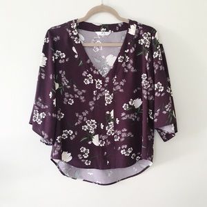 plum floral blouse